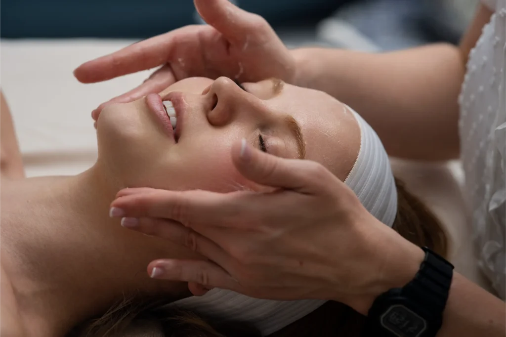 Woman getting natural treatment on face