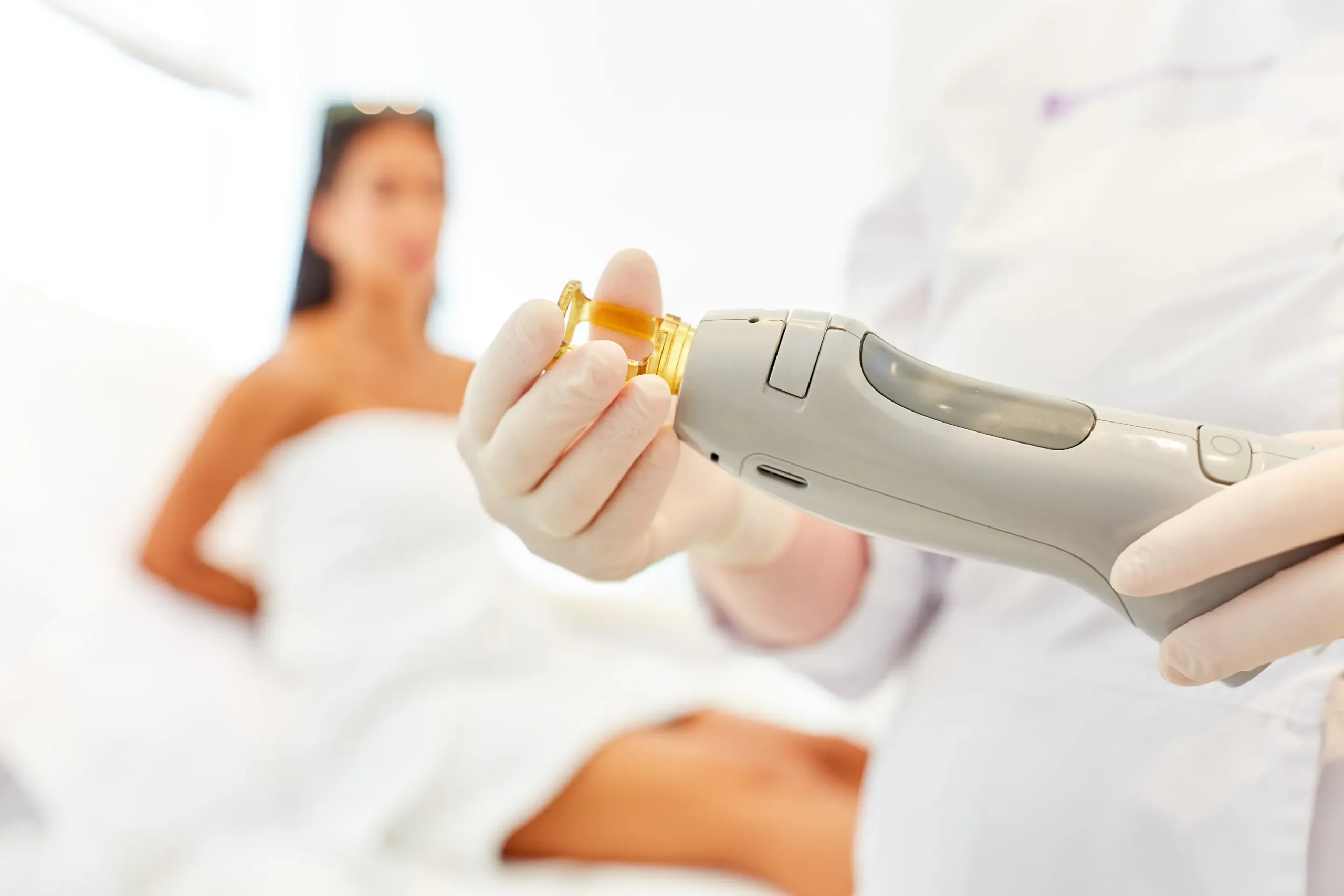 Laser hair removal machine held by worker