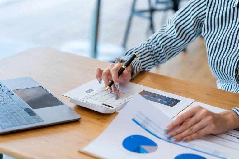 Person looking at data for investment in a med spa