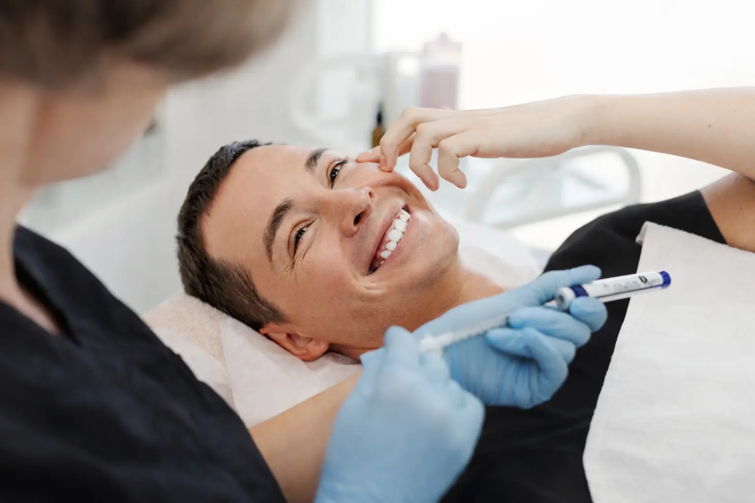 Client getting injections on face