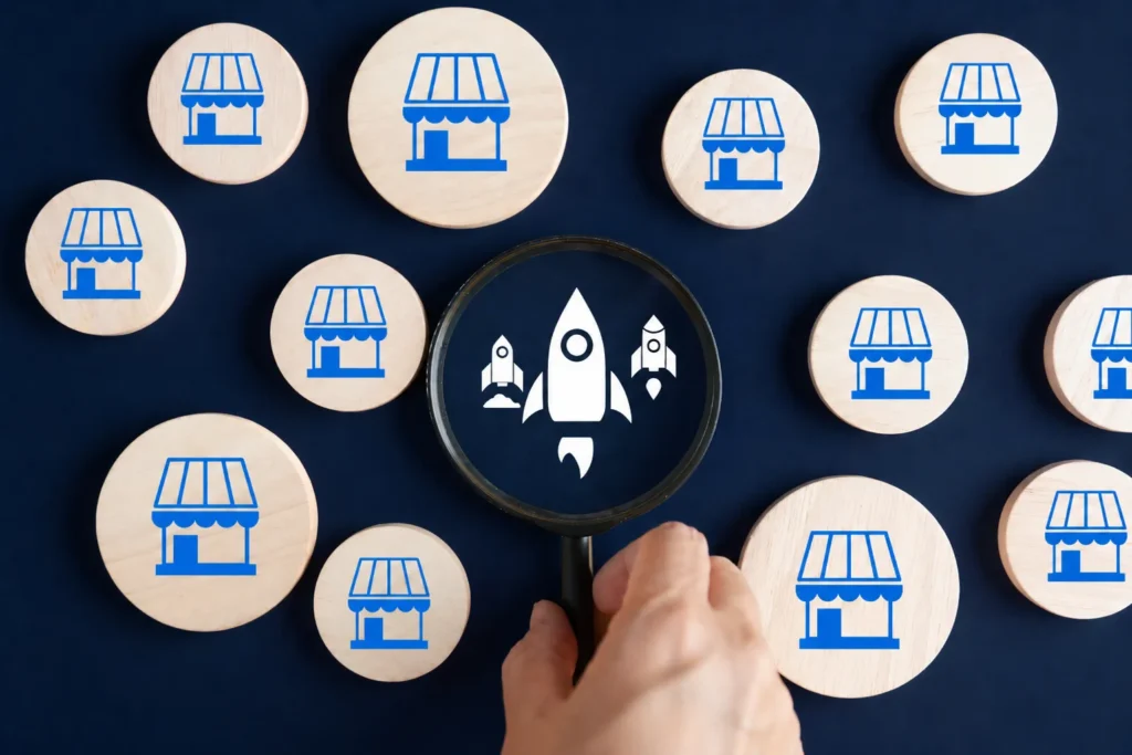 holding magnifying glass over rocket with store locations