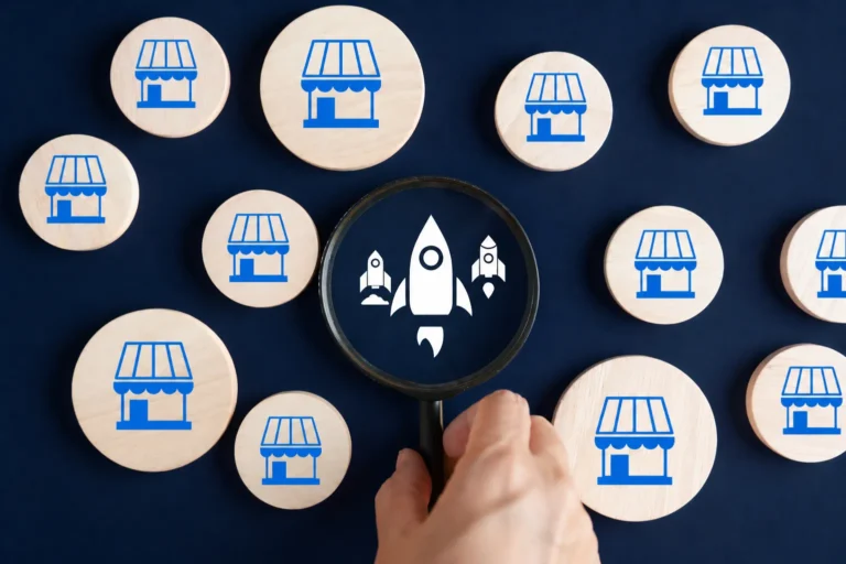 holding magnifying glass over rocket with store locations